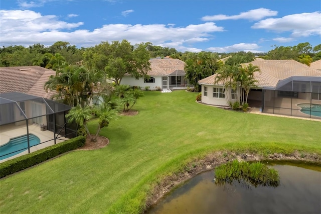 birds eye view of property featuring a water view