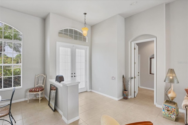 tiled foyer with french doors