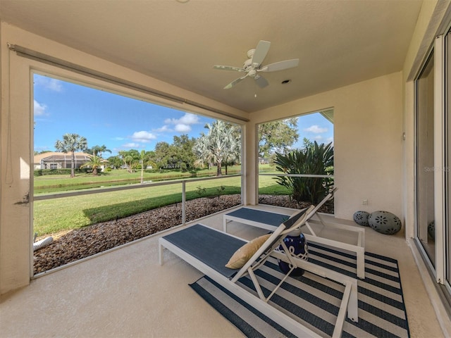 view of patio featuring ceiling fan