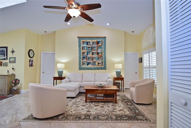 living room with vaulted ceiling and ceiling fan