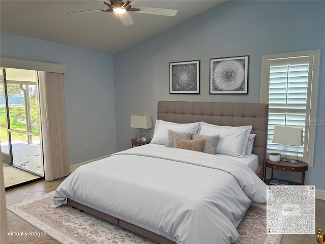 217 Carriage House Ln Unit 217, Nokomis, FL 34275 - bedroom with vaulted ceiling, access to exterior, tile patterned floors, baseboards, and a ceiling fan