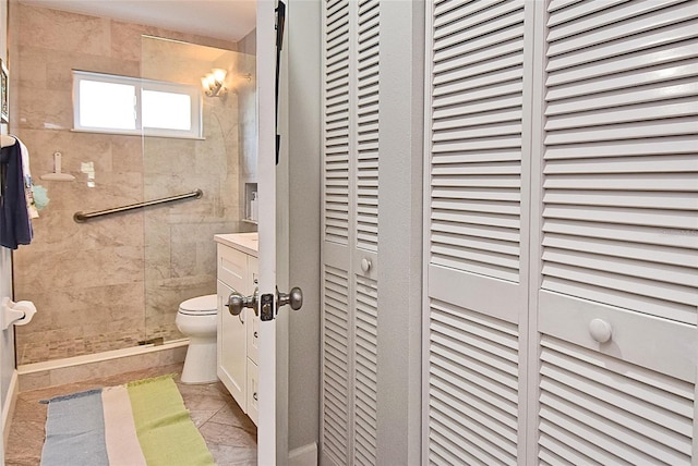 217 Carriage House Ln Unit 217, Nokomis, FL 34275 - bathroom featuring a closet, a stall shower, and toilet