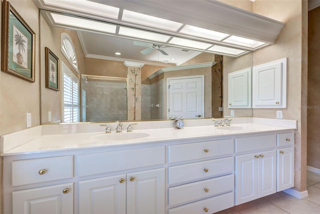 bathroom featuring ceiling fan, an enclosed shower, vanity, ornamental molding, and tile patterned floors