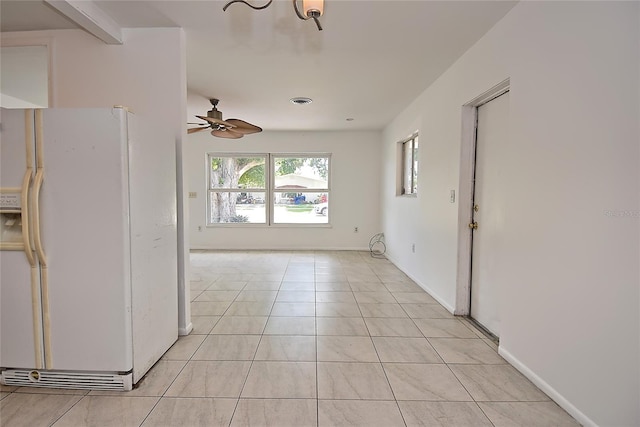 interior space featuring ceiling fan