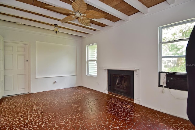 unfurnished living room with ceiling fan, wood ceiling, and beam ceiling