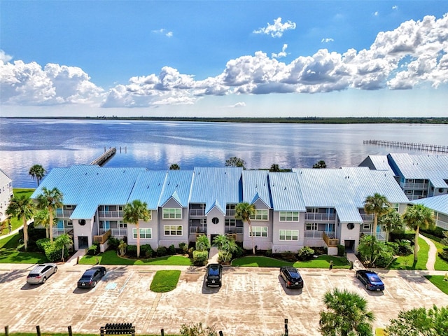 birds eye view of property featuring a water view