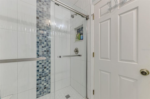 bathroom featuring walk in shower