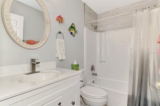 full bathroom with vanity, toilet, and shower / bath combo with shower curtain