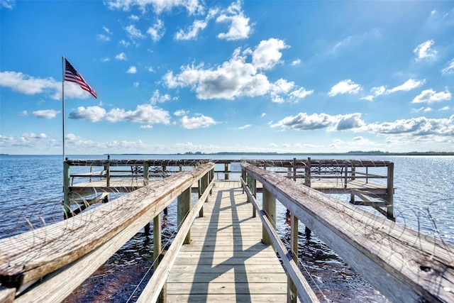 dock area featuring a water view