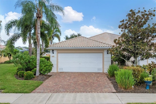 view of front of property with a garage