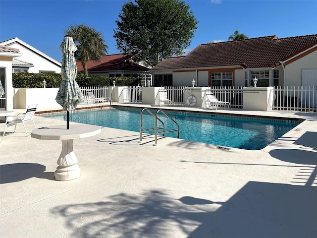 view of pool with a patio