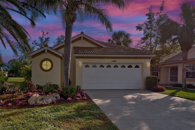 view of front of home featuring a garage