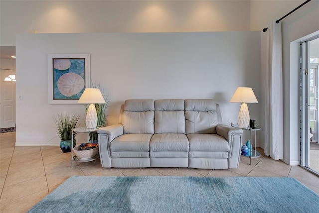 living room with light tile patterned floors