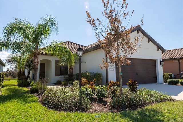 mediterranean / spanish-style house featuring a garage