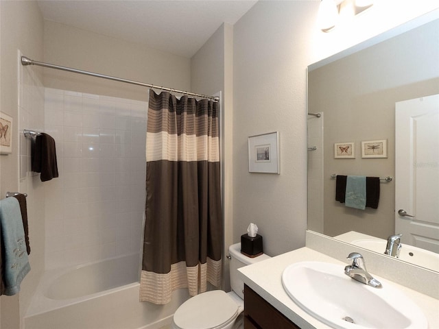 full bathroom featuring vanity, shower / tub combo with curtain, and toilet