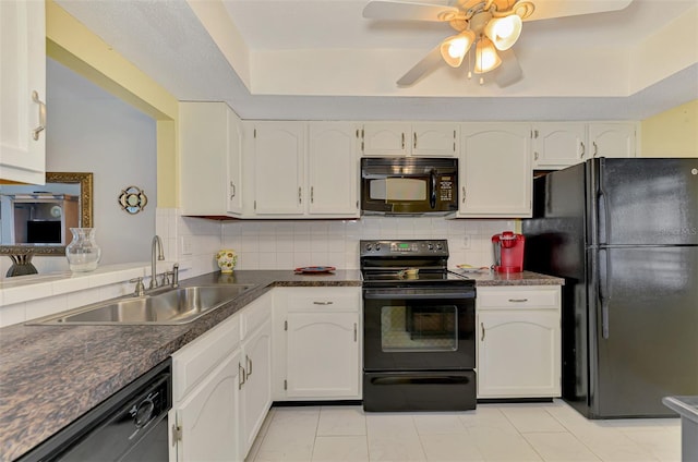 kitchen with decorative backsplash, ceiling fan, sink, black appliances, and white cabinets