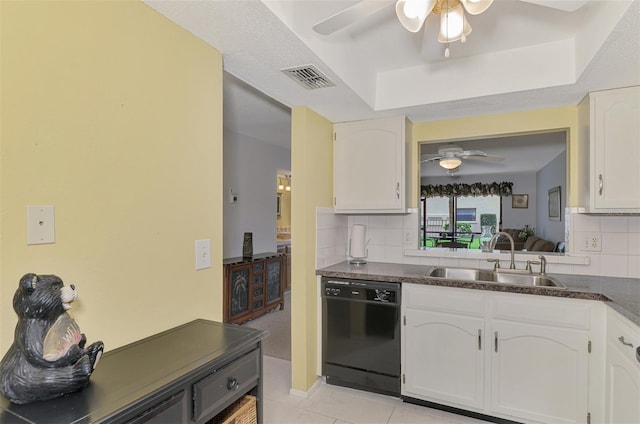 kitchen featuring white cabinets, dishwasher, backsplash, and sink