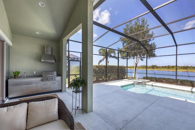 view of swimming pool with a water view, grilling area, an in ground hot tub, glass enclosure, and a patio area