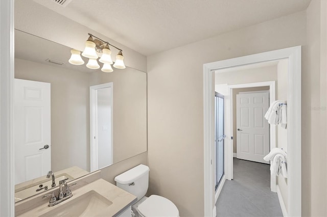 bathroom with tile patterned floors, toilet, and vanity