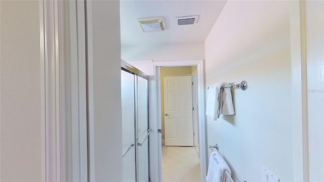 bathroom featuring walk in shower