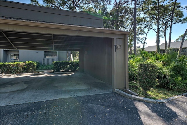 view of car parking with a carport