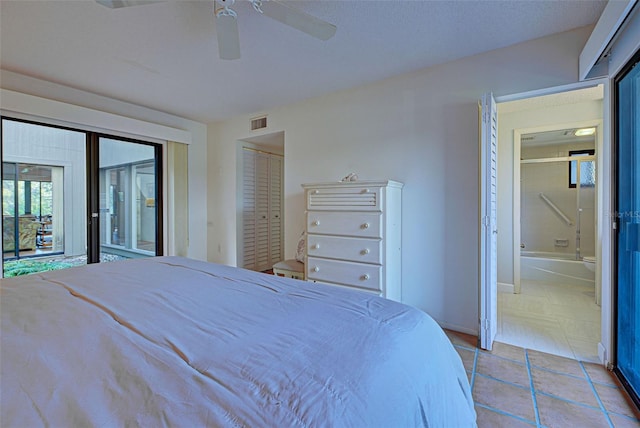 bedroom with ceiling fan, a closet, connected bathroom, and access to outside