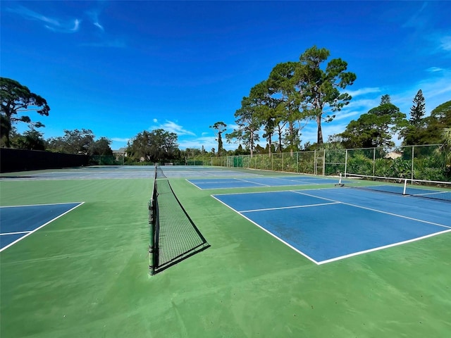 view of tennis court with basketball court