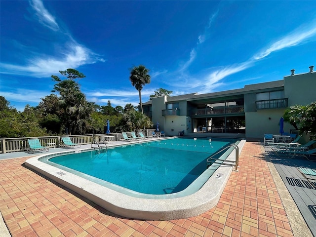 201 Woodland Dr Unit 201, Osprey, FL 34229 - community pool with a patio