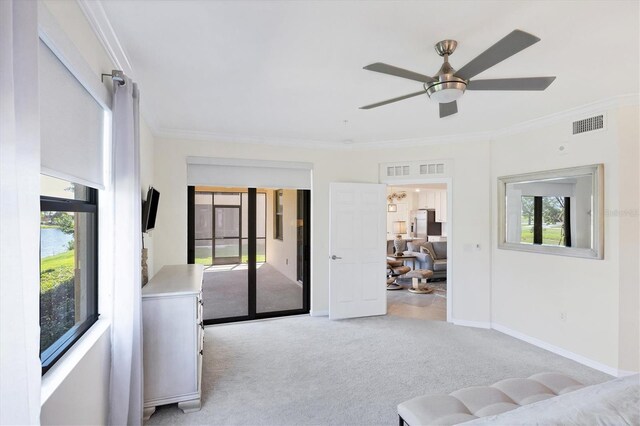 unfurnished bedroom with ceiling fan, light colored carpet, crown molding, and multiple windows