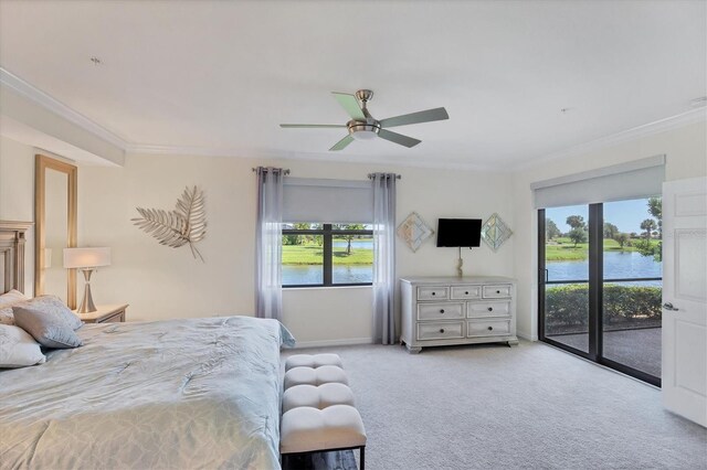 bedroom with access to exterior, multiple windows, ceiling fan, and light carpet