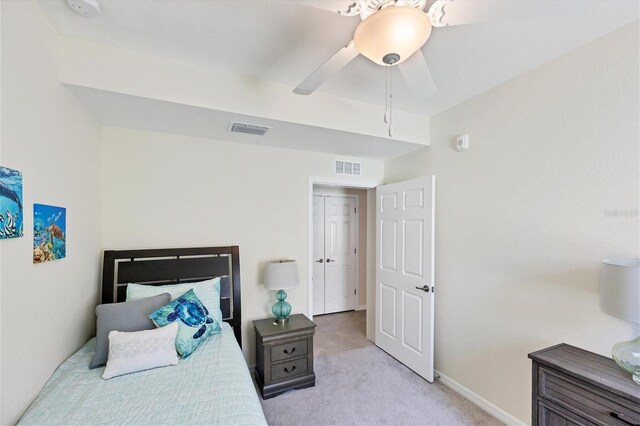 carpeted bedroom with ceiling fan