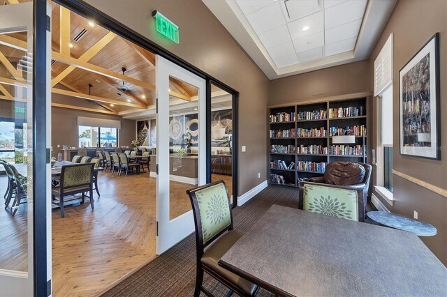 office area featuring beamed ceiling and parquet floors