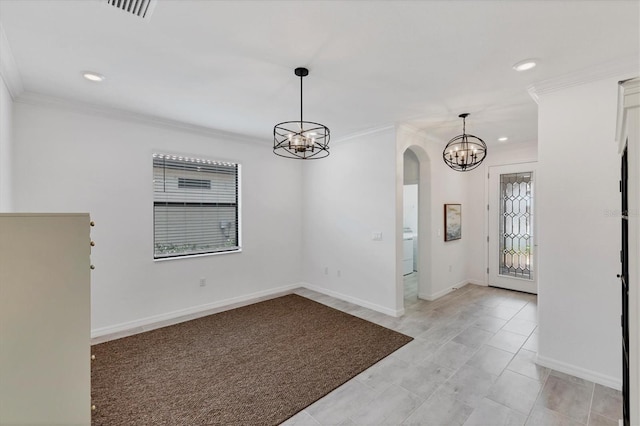 interior space featuring washer / clothes dryer and crown molding