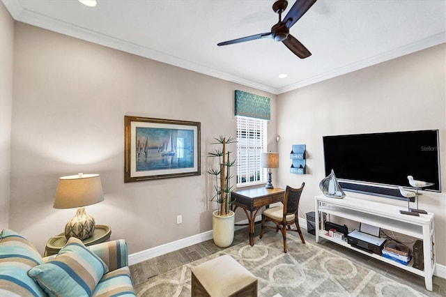 office with hardwood / wood-style floors, ceiling fan, and crown molding