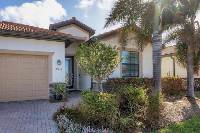 view of front of home with a garage