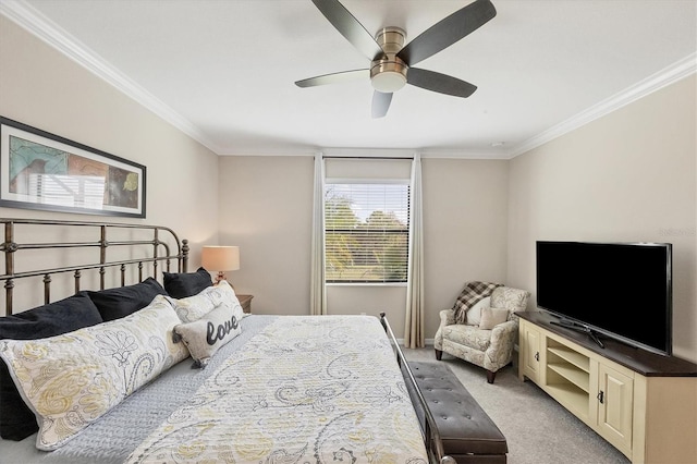 bedroom featuring ceiling fan, light carpet, and ornamental molding