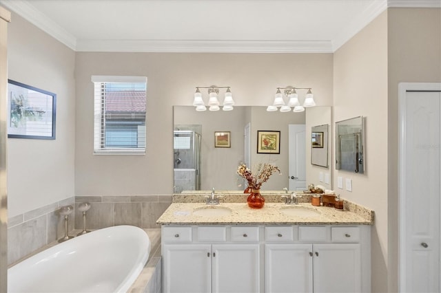 bathroom with vanity, ornamental molding, and independent shower and bath