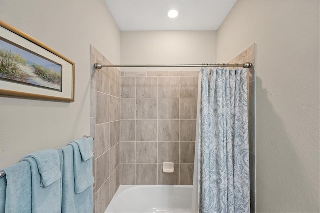 bathroom featuring shower / bath combination with curtain