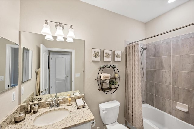 full bathroom featuring toilet, shower / bath combination with curtain, and vanity