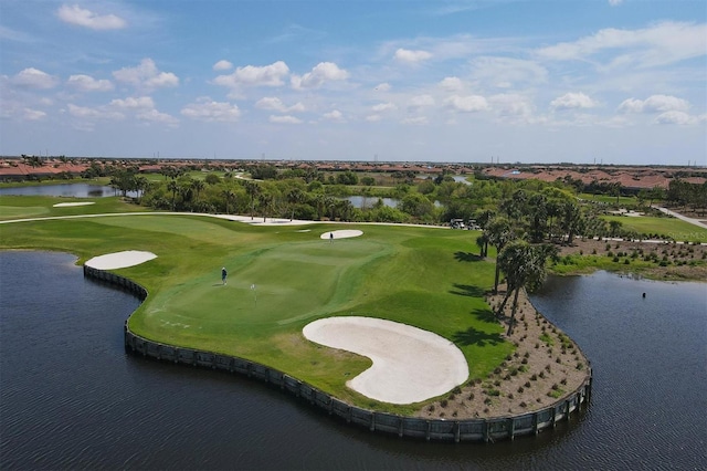 surrounding community featuring a water view