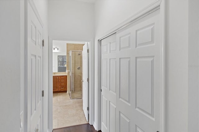 hall featuring tile patterned floors