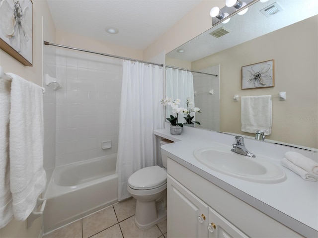 full bathroom with vanity, shower / tub combo with curtain, toilet, and tile patterned flooring