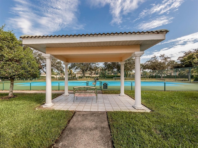 view of patio / terrace featuring fence