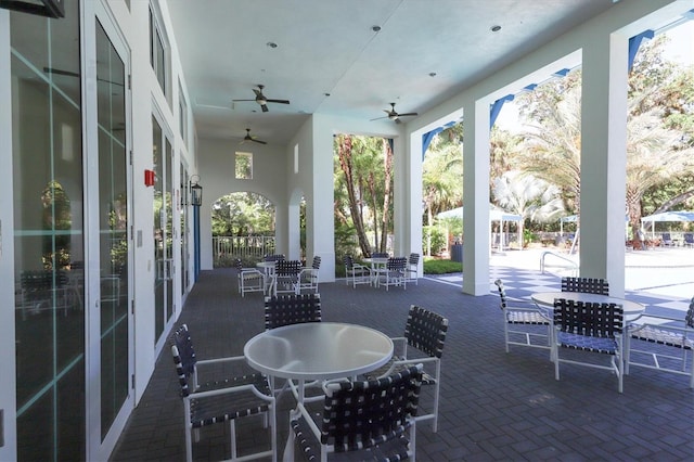 view of patio featuring ceiling fan