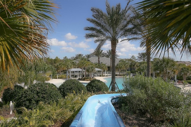 surrounding community with a gazebo and a pool