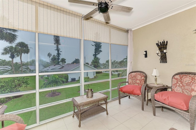 sunroom featuring plenty of natural light and ceiling fan