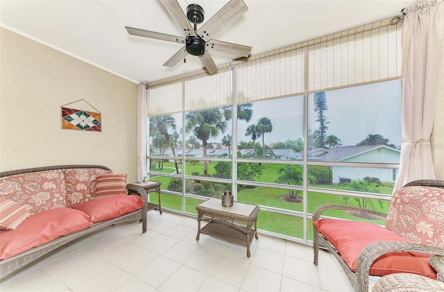 sunroom / solarium with ceiling fan