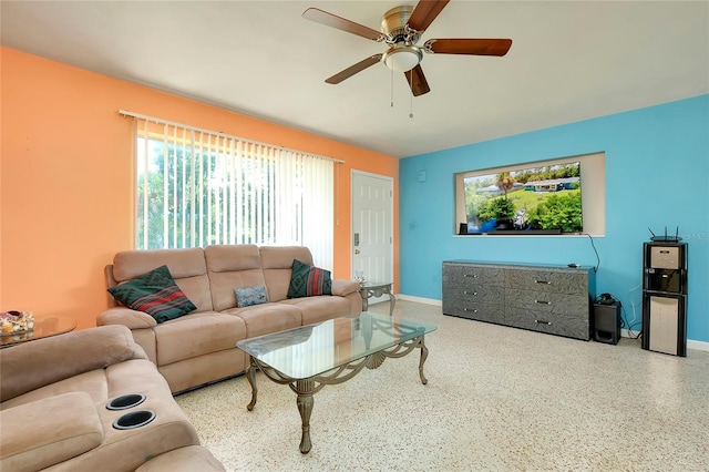 living room featuring ceiling fan