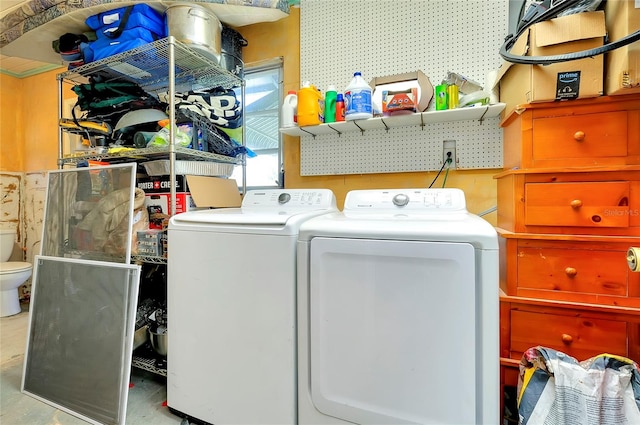 laundry area featuring washer and clothes dryer