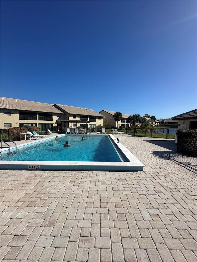 view of pool with a patio area